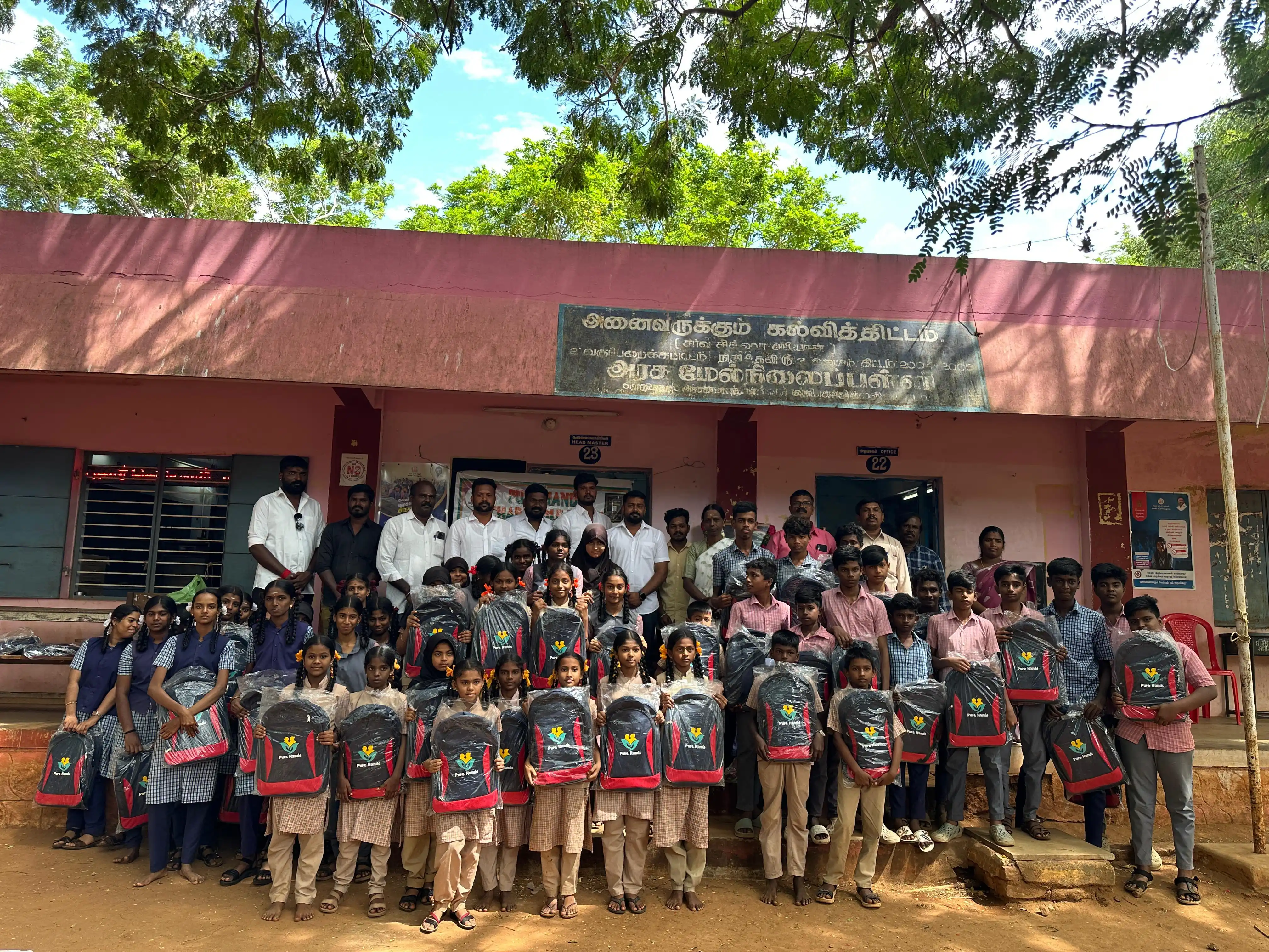 Educational aid distributed to Neduvayal Government School students on the birth anniversary of Perunthalaivar Kamarajar