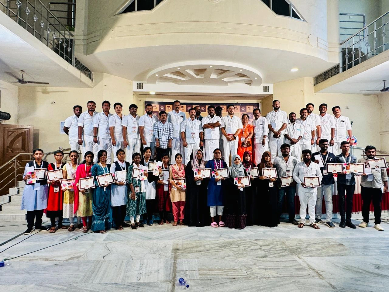 T.R. Krishnaraja mentoring college students as part of a leadership training initiative to develop future party speakers