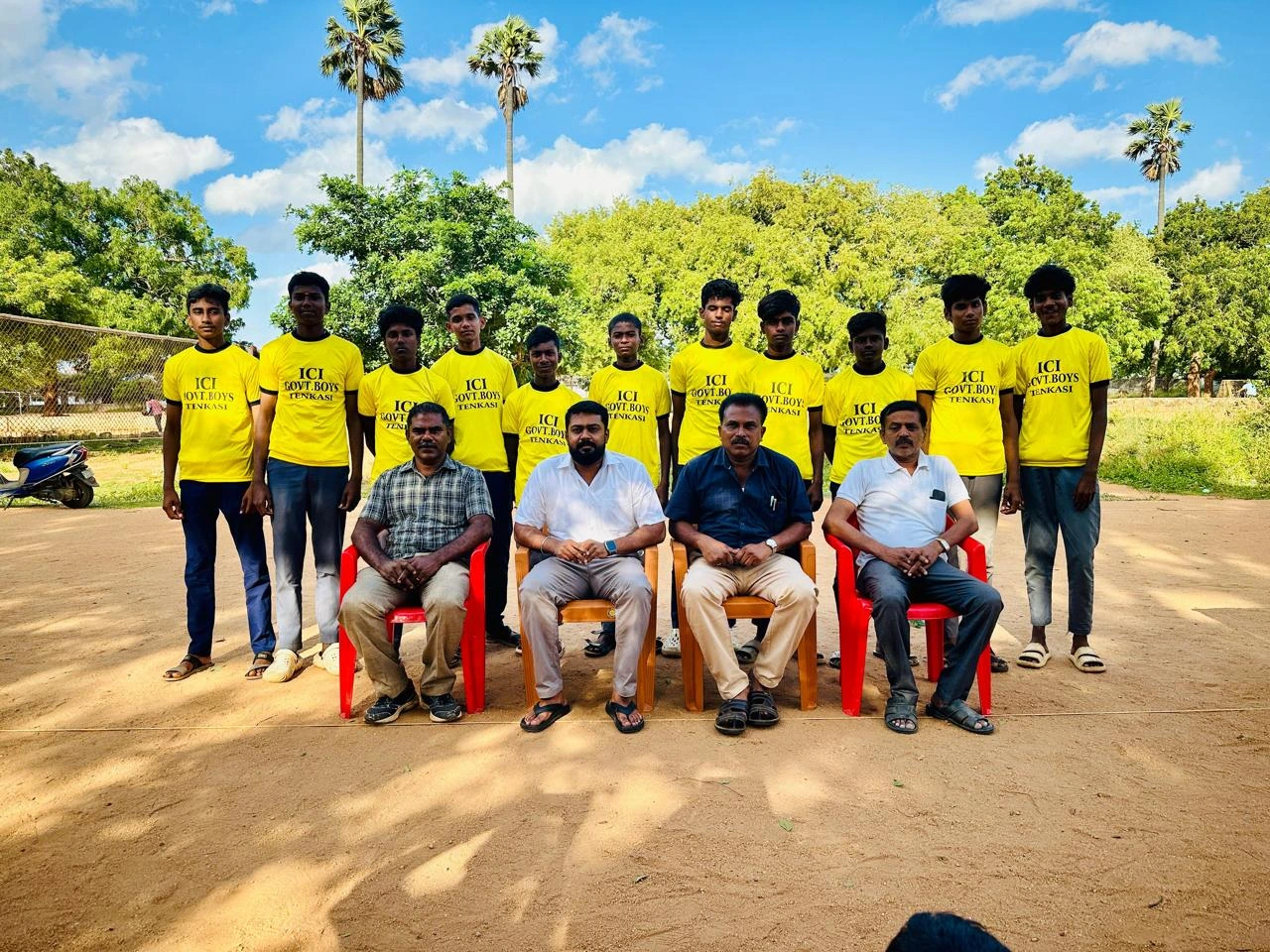 Students receiving sports uniforms as part of a youth development initiative led by T.R. Krishnaraja and DMK Youth Wing